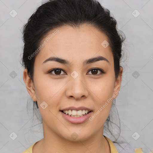 Joyful latino young-adult female with short  brown hair and brown eyes