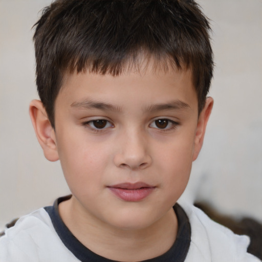 Joyful white child male with short  brown hair and brown eyes