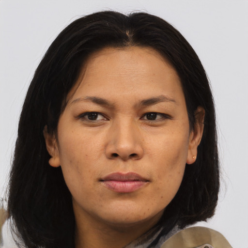 Neutral asian young-adult female with medium  brown hair and brown eyes