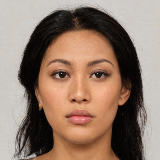 Neutral asian young-adult female with medium  black hair and brown eyes