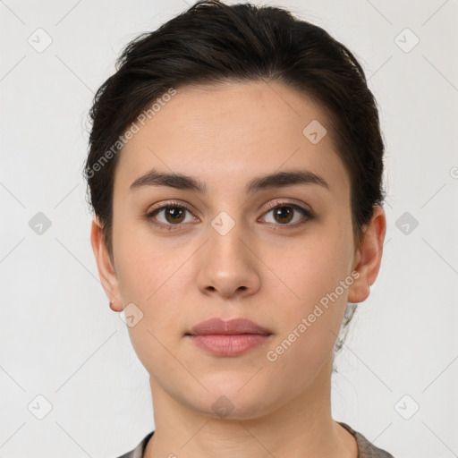 Neutral white young-adult female with short  brown hair and brown eyes