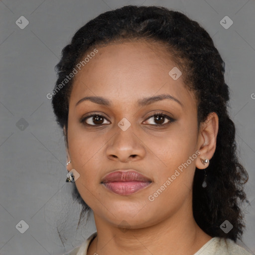 Joyful black young-adult female with medium  brown hair and brown eyes