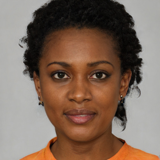 Neutral black young-adult female with short  brown hair and brown eyes