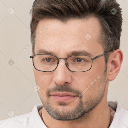 Neutral white adult male with short  brown hair and brown eyes