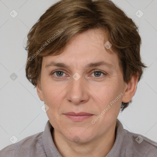 Joyful white adult female with short  brown hair and brown eyes