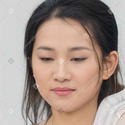 Joyful asian young-adult female with medium  brown hair and brown eyes