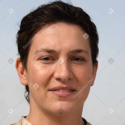 Joyful white adult female with short  brown hair and grey eyes