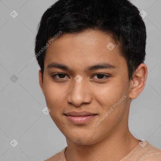 Joyful latino young-adult male with short  brown hair and brown eyes