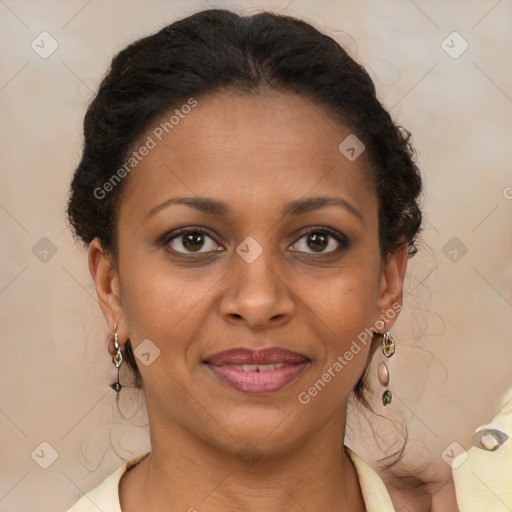 Joyful black young-adult female with long  brown hair and brown eyes