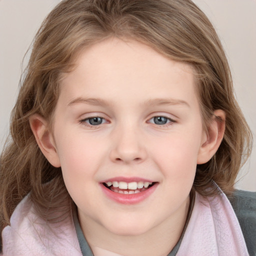 Joyful white child female with medium  brown hair and blue eyes