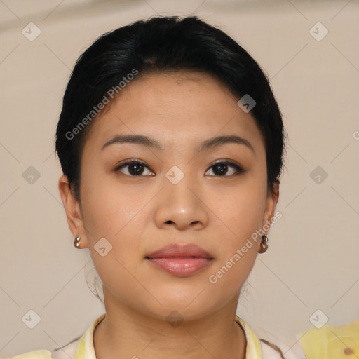 Joyful latino young-adult female with short  brown hair and brown eyes