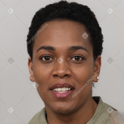 Joyful black young-adult female with short  black hair and brown eyes