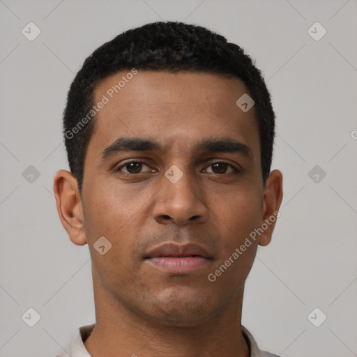 Neutral latino young-adult male with short  black hair and brown eyes