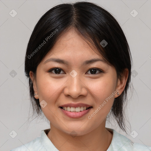 Joyful asian young-adult female with medium  brown hair and brown eyes