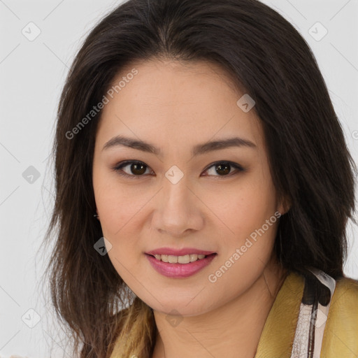 Joyful asian young-adult female with long  brown hair and brown eyes