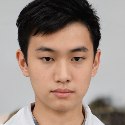 Neutral asian young-adult male with short  black hair and brown eyes