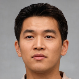 Neutral asian young-adult male with short  brown hair and brown eyes