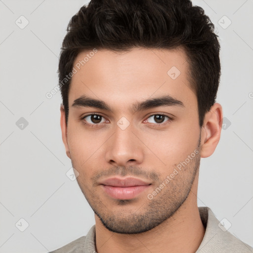 Neutral white young-adult male with short  brown hair and brown eyes