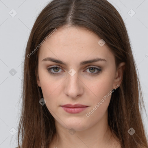 Neutral white young-adult female with long  brown hair and brown eyes