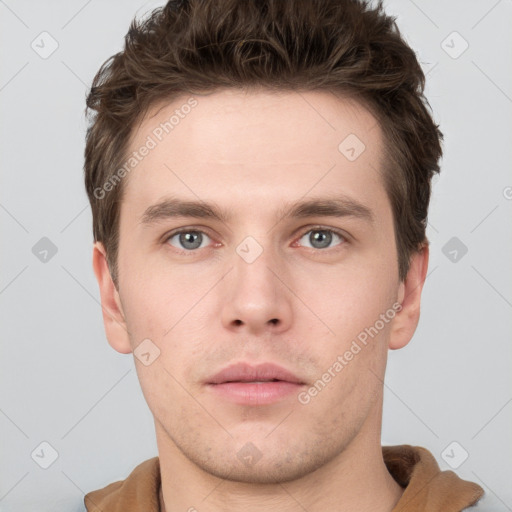 Neutral white young-adult male with short  brown hair and grey eyes