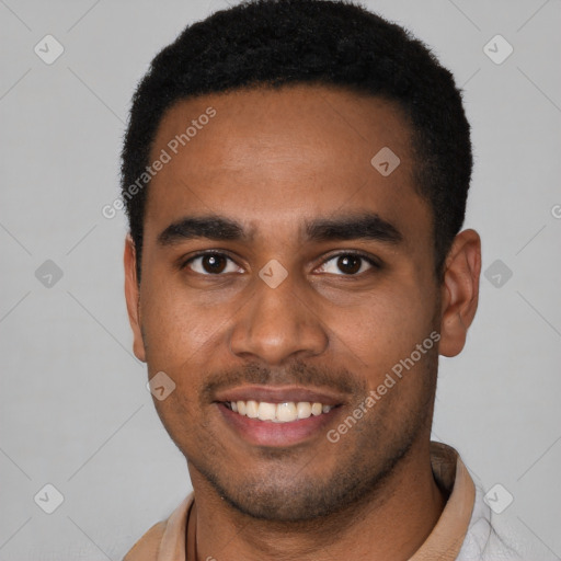 Joyful black young-adult male with short  brown hair and brown eyes