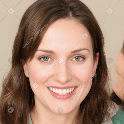 Joyful white young-adult female with medium  brown hair and green eyes