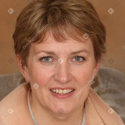 Joyful white adult female with medium  brown hair and blue eyes