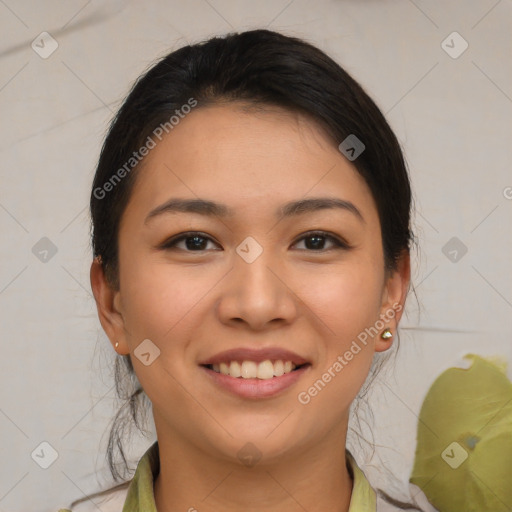 Joyful asian young-adult female with medium  brown hair and brown eyes