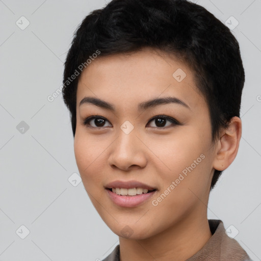 Joyful asian young-adult female with short  black hair and brown eyes