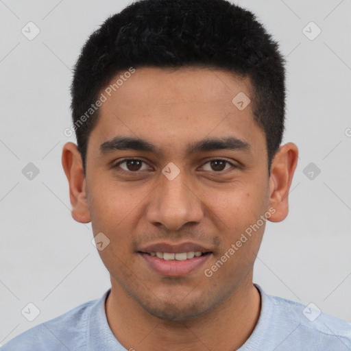 Joyful latino young-adult male with short  black hair and brown eyes