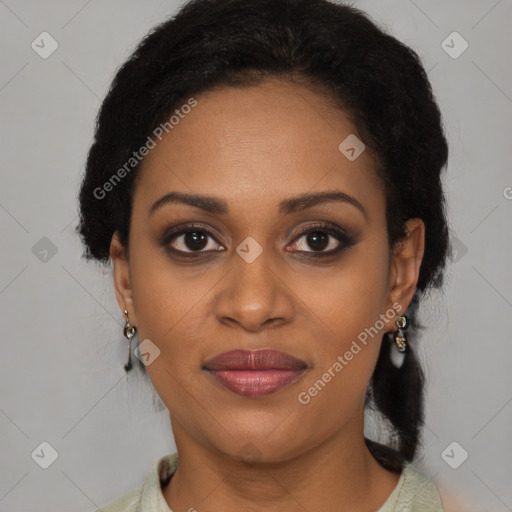 Joyful black young-adult female with short  brown hair and brown eyes