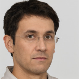 Neutral white adult male with short  brown hair and brown eyes