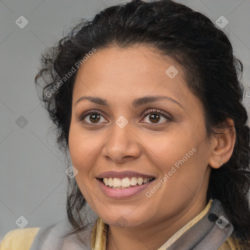 Joyful white adult female with medium  brown hair and brown eyes