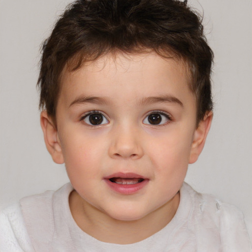 Joyful white child male with short  brown hair and brown eyes