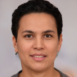 Joyful white adult female with short  brown hair and brown eyes