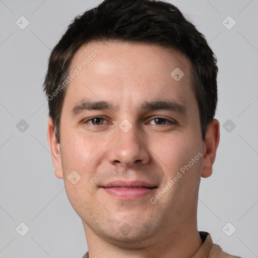 Joyful white young-adult male with short  brown hair and brown eyes