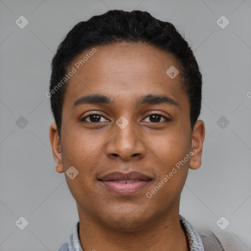 Joyful black young-adult male with short  black hair and brown eyes