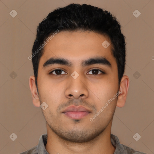 Neutral latino young-adult male with short  black hair and brown eyes