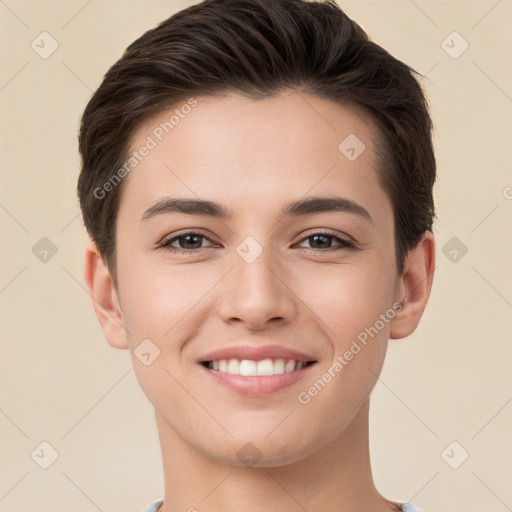 Joyful white young-adult female with short  brown hair and brown eyes