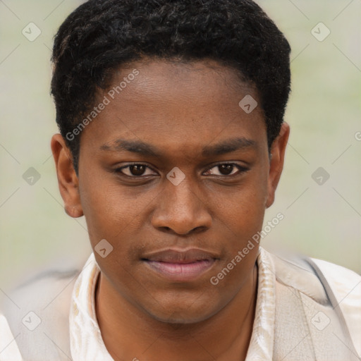 Joyful black young-adult male with short  brown hair and brown eyes