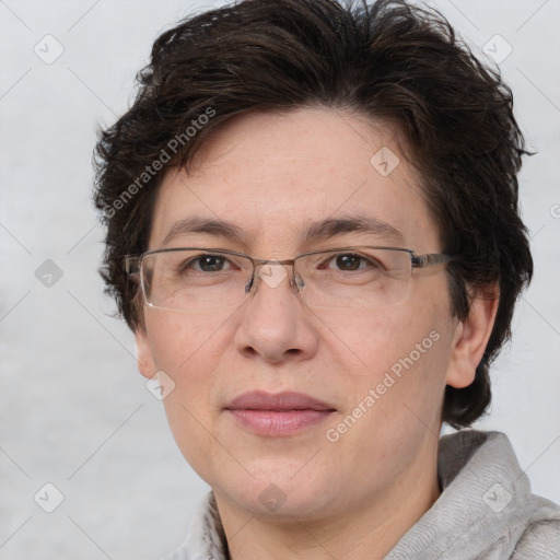 Joyful white adult female with short  brown hair and brown eyes