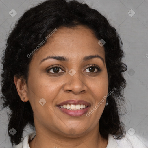 Joyful black young-adult female with medium  brown hair and brown eyes