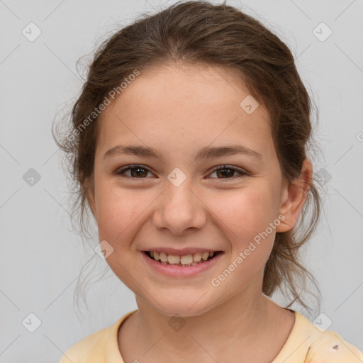 Joyful white child female with medium  brown hair and brown eyes