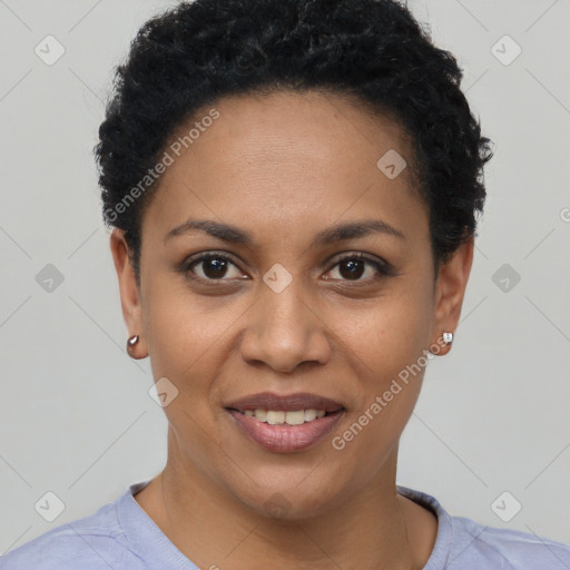 Joyful black young-adult female with short  black hair and brown eyes