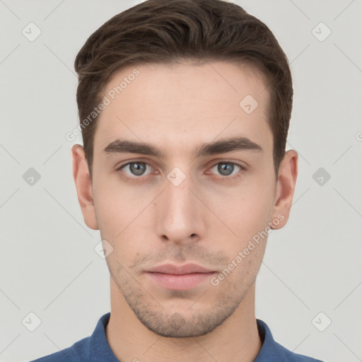 Neutral white young-adult male with short  brown hair and grey eyes