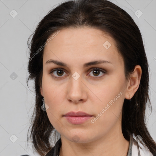 Neutral white young-adult female with long  brown hair and brown eyes