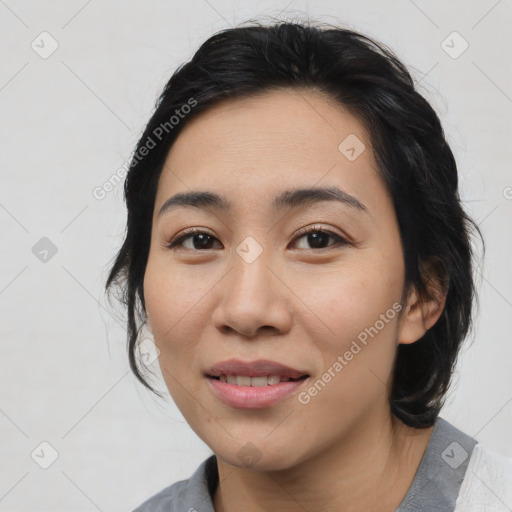 Joyful white young-adult female with medium  black hair and brown eyes