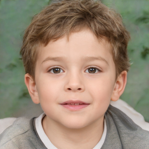 Joyful white child male with short  brown hair and brown eyes