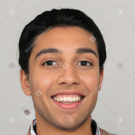 Joyful white young-adult male with short  black hair and brown eyes