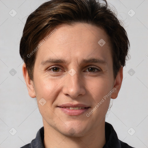 Joyful white adult male with short  brown hair and grey eyes